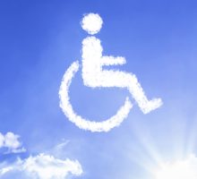 Wheelchair,symbol,written,a,cloud,with,a,blue,sky